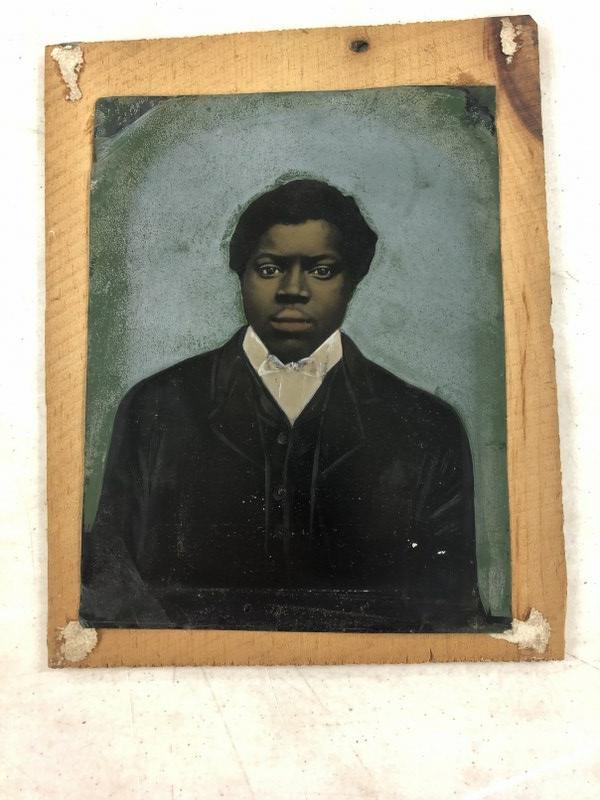 Hand Painted tintype of African American man, measures 8.5" x 6.5".   From the estate collection of (1 of 1)