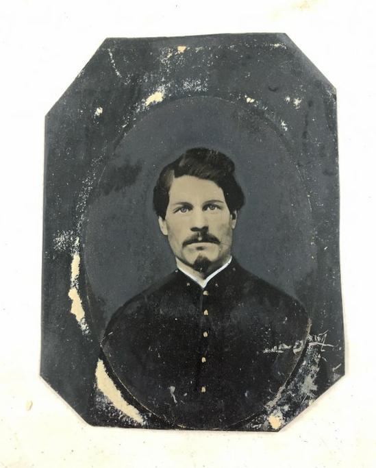 Civil War Hand Painted tintype of unidentified Soldier, with identifying label on back of wood that: Civil War Hand Painted tintype of unidentified Soldier, with identifying label on back of wood that was on frame, copied by H P Moore, Concord, N.H. Image measures 8.5" x 6.5". From the estate collect