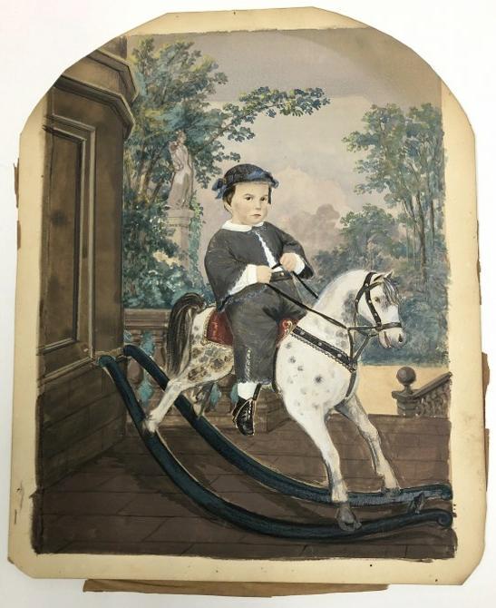 Hand Painted photograph of child on rocking horse, 9.5" x 7.5." From the estate collection of: Hand Painted photograph of child on rocking horse, 9.5" x 7.5." From the estate collection of Richard G. Miller's 19th & 20th century hand painted, coloured & tinted photography.