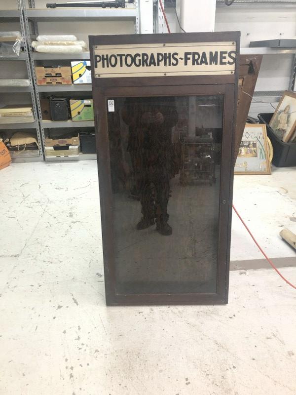 Circa 1920's PHOTOGRAPHS-FRAMES wood one door display case with metal painted sign above. (no key ). (1 of 3)