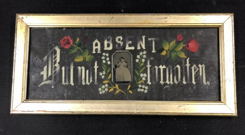 Victorian hand stitched motto ( Absent But Not Forgotten, with tintype of young child in center, in: Victorian hand stitched motto ( Absent But Not Forgotten, with tintype of young child in center, in period lemon gilt frame which measures 11" x 23", nice condition, from local family's estate.