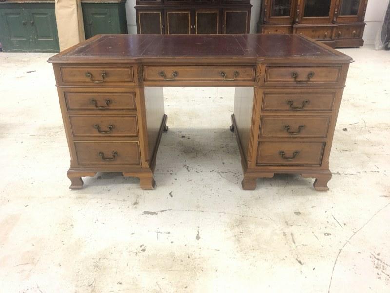 Nice older partners desk with leather top, can use different configurations on each side, there are: Nice older partners desk with leather top, can use different configurations on each side, there are (2) with 4 drawers and (2) with a single drawer on top & faux drawers that open as a door. I am not 