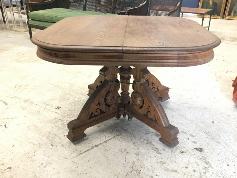 Circa 1910 oak split pedestal dining table with carved base, base needs to be reattached more (1 of 2)