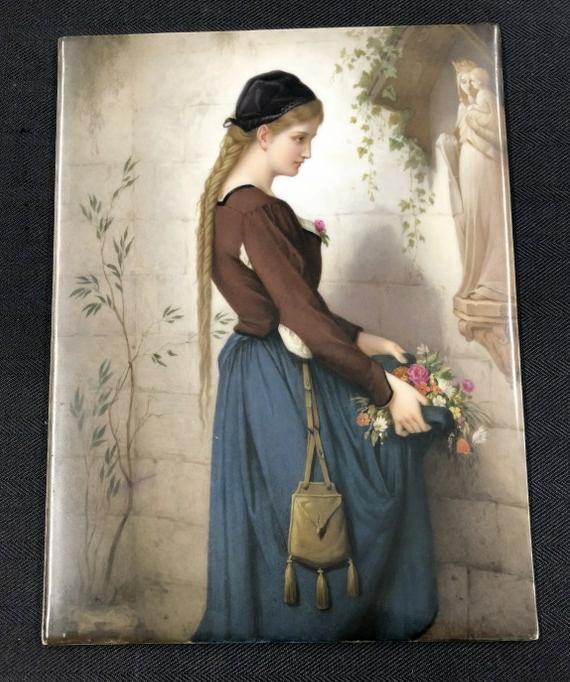 KPM porcelain plaque with woman holding basket of flowers at wall with religious statue in (1 of 6)