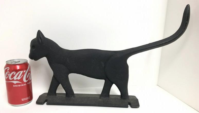 17.5" long cast iron cat bootscraper, in nice condition, not very old, but nice lookingâ€¦. (1 of 1)