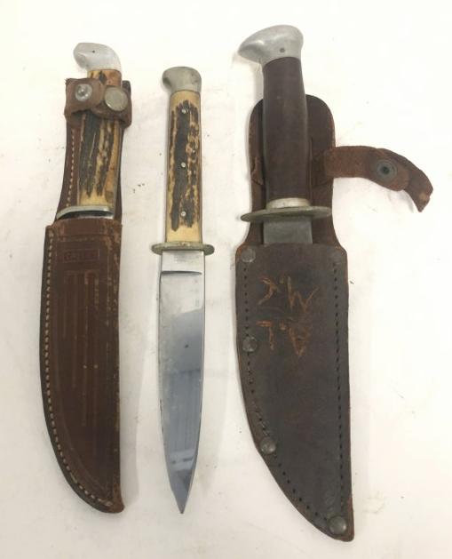 (3) older fixed blade hunting knives including CASE, found in local estate. ( 2 ) with sheaths, (1 of 7)