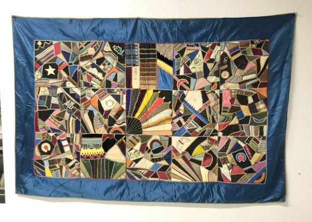 Victorian silk crazy quilt, hand stitched, from local estate's family, passed down. Tape on back (1 of 7)