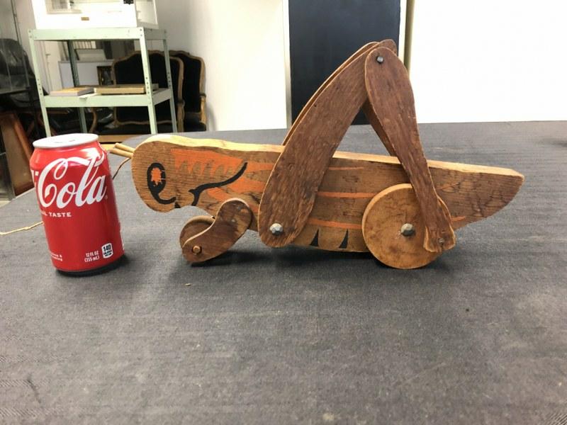 Old wood pull toy mechanical grasshopper, from Hudson Valley estate, moves freely, measures 14": Old wood pull toy mechanical grasshopper, from Hudson Valley estate, moves freely, measures 14" long.