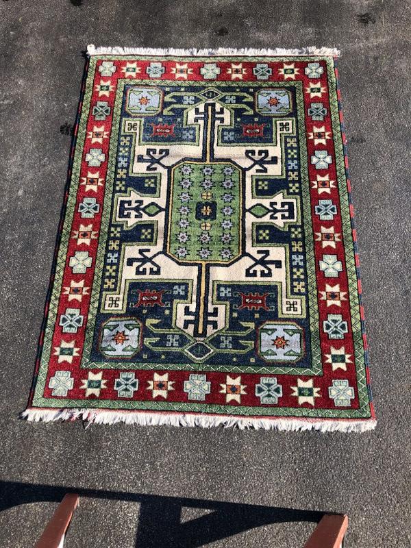 Handmade wool decorative oriental rug, measures 77" x 55.5", nice condition, from local home of (1 of 3)