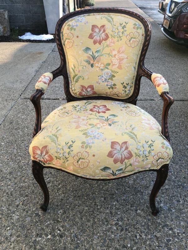 Wonderful carved French style armchair, with decorative fabric, from fine non smoking home,: Wonderful carved French style armchair, with decorative fabric, from fine non smoking home, structurally sound. Measures approx.25.25" wide arm to arm x 22.5" deep x 37" high.