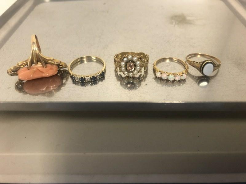 (5) estate 10K rings with stones, some pearls, one coral with diamond chips. From estate in (1 of 4)