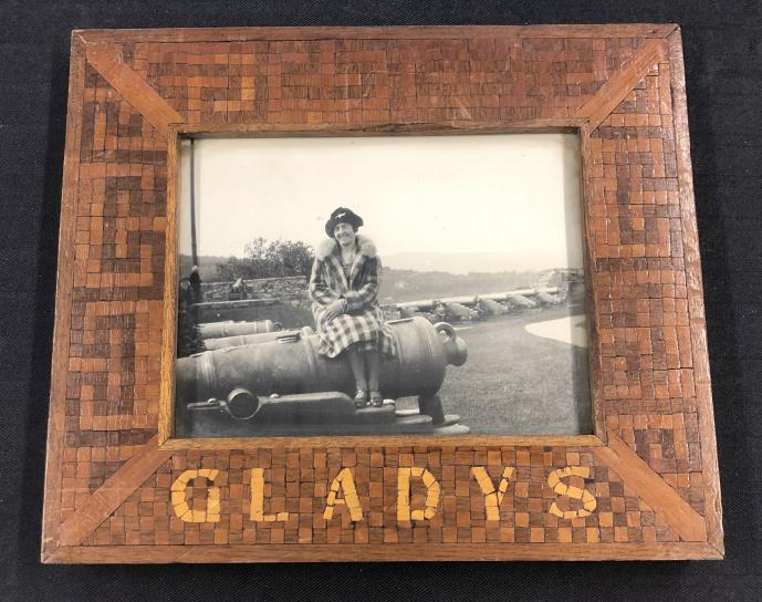 Folk art frame with ( GLADYS ) inlaid on bottom, with picture of her sitting on a cannon, circa (1 of 1)