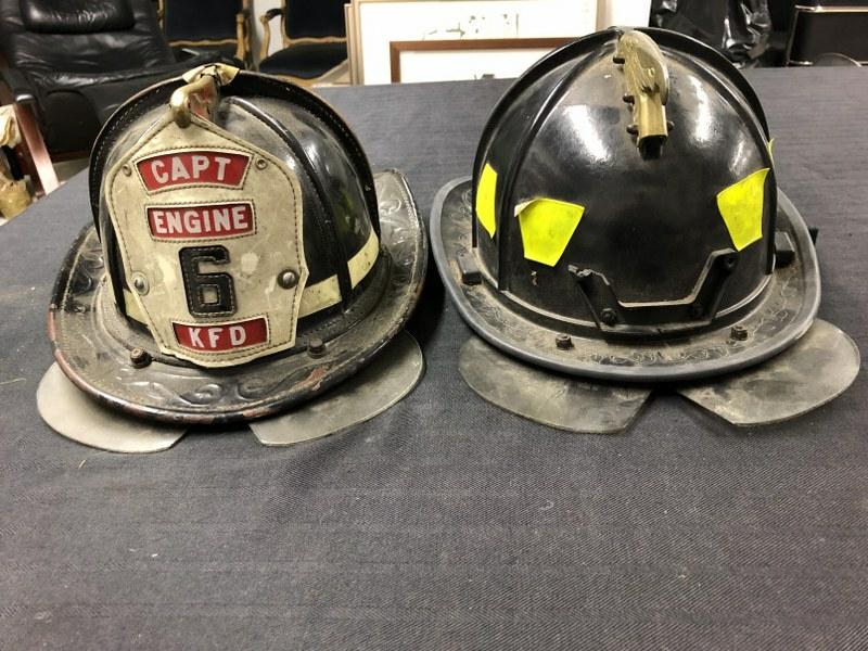 (2) vintage fire helmets from Kingston, N.Y. estate, one leather ( with Captain badge ) This made by (1 of 6)