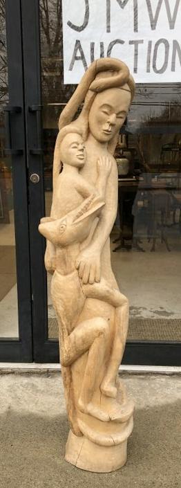 52" high carved sculpture with figures & snake on top, signed and dated as pictured, unsure of: 52" high carved sculpture with figures & snake on top, signed and dated as pictured, unsure of origin. From NYC estate of Doctor's who traveled . Dated 1965.