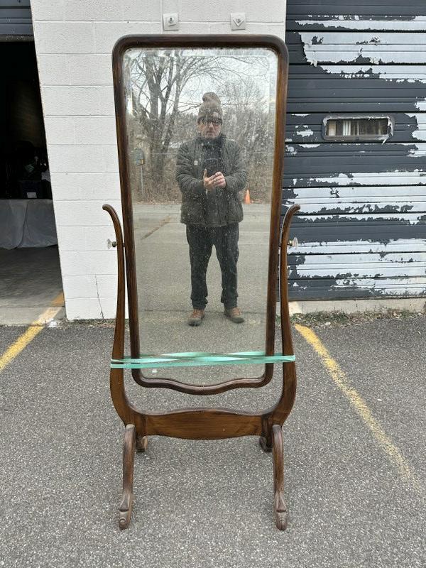 Circa 1920's cheval mirror, claw feet ( pieces missing off the feet ) from estate of Vassar College: Circa 1920's cheval mirror, claw feet ( pieces missing off the feet ) from estate of Vassar College Professor. Measures 66" high x 26.5" wide, made of a hardwood, maybe birch or maple, and old worn fi