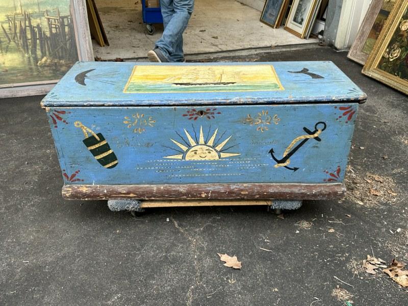 19th century dovetailed blanket box in an older blue paint, with later painted designs. Original: 19th century dovetailed blanket box in an older blue paint, with later painted designs. Original till and hardware intact, blanket box measures 44" long x 18" deep x 17" high. Structurally sound, from