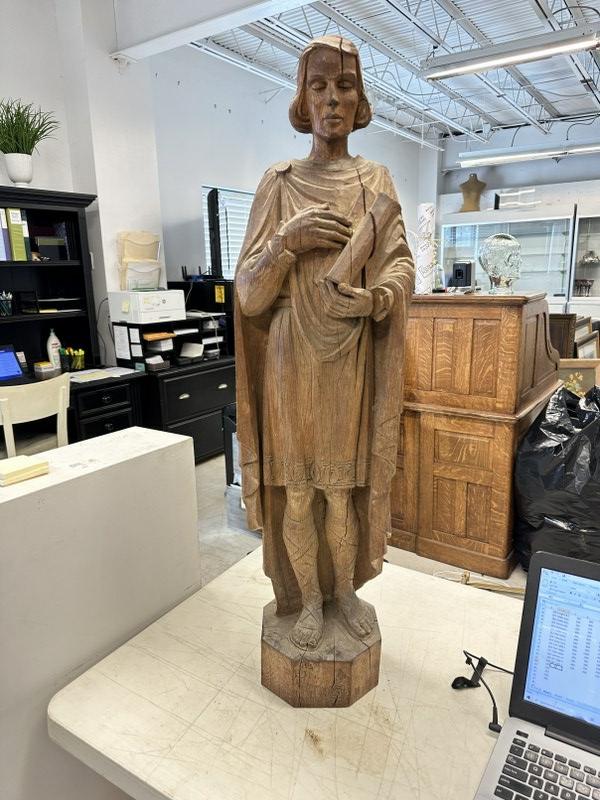 38" high carved wood statue of a Saint, made of oak, good weight, has age splits as pictured. From: 38" high carved wood statue of a Saint, made of oak, good weight, has age splits as pictured. From estate of Master carver John J. Noe, of New York City, who ran a shop that did all architectural work
