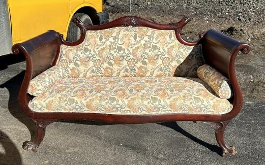 Circa 1900 flamed mahogany loveseat with Eagle heads on top back & winged claw feet, structurally: Circa 1900 flamed mahogany loveseat with Eagle heads on top back & winged claw feet, structurally sound, from stone house in Hudson Valley, beautiful graining on sides. Measures 61" wide x 38" high x 