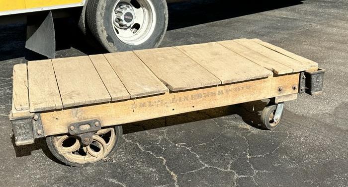 Old Industrial cart, good looking, wheels freely, nice weathered oak boards on top, measures 62": Old Industrial cart, good looking, wheels freely, nice weathered oak boards on top, measures 62" long x 31" deep x 15.5" high, was used in old stone house as coffee table at one time.