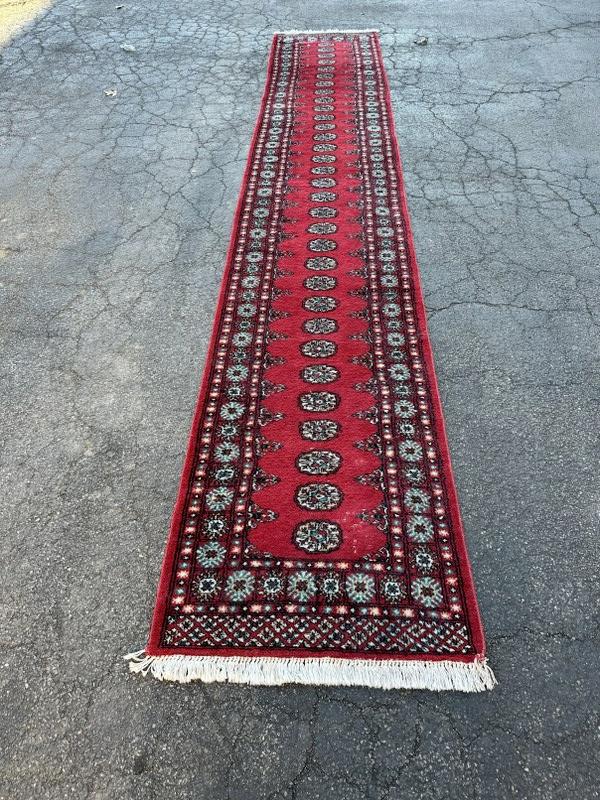 Handmade wool oriental runner, in nice condition, from Hudson Valley home, measures 16' 10" x 2' 6".: Handmade wool oriental runner, in nice condition, from Hudson Valley home, measures 16' 10" x 2' 6".