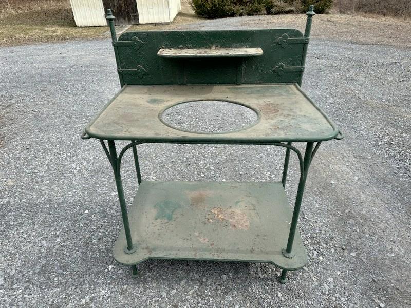 Wonderful circa 1900 iron washstand, great detail, structurally sound, older green paint, some: Wonderful circa 1900 iron washstand, great detail, structurally sound, older green paint, some surface rust showing, has towel bars on side, usedin Hudson Valley estate on back porch, would look great