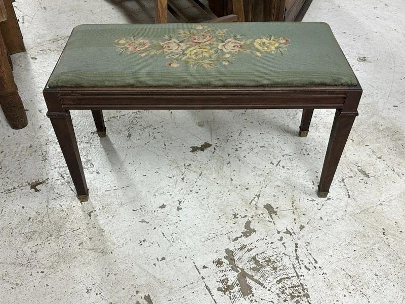 Mahogany needlepoint piano bench in nice estate condition, brass caps on bottom of feet,: Mahogany needlepoint piano bench in nice estate condition, brass caps on bottom of feet, structurally sound, measures 19" high x 35" wide x 15" deep.