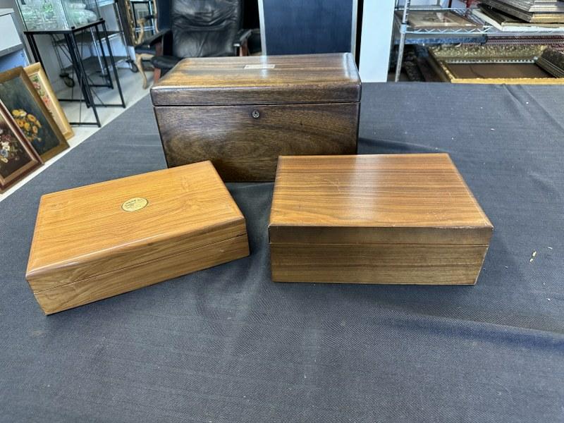 (3) HUMIDORS from estate, including larger one with sterling presentation placque, as pictured for: (3) HUMIDORS from estate, including larger one with sterling presentation placque, as pictured for YALE-PRINCETON 1921 ELECTON DAY H'CAP. This box measures 15" x 9" x 8" high, a smaller walnut one mea