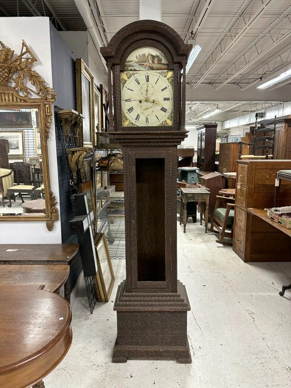 Unusual foreign (?) older grandfathers clock, has an almost tramp art case and top, no pendulum, no: Unusual foreign (?) older grandfathers clock, has an almost tramp art case and top, no pendulum, no weights, no glass on top or body, as we found it, has handpainted scenic face. Measures 87" high.