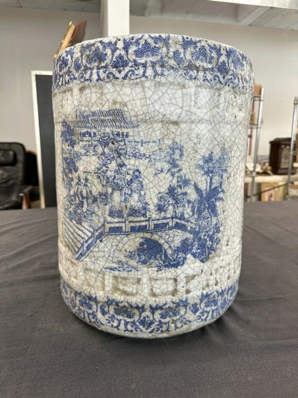 Older Asian ceramic umbrella holder or vessel of some sort, has crackling in glaze all throughout.: Older Asian ceramic umbrella holder or vessel of some sort, has crackling in glaze all throughout. Same scenic pattern on (3 ) sides, it measures 17.25" high x 13.25" across the top. Found in hallway 