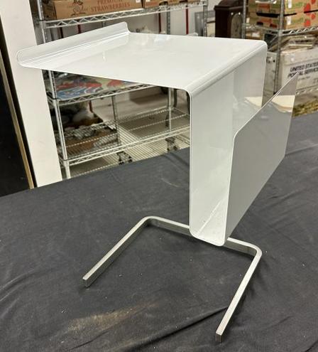 Cool circa 1980's or so Modern looking stand with book or magazine holder on side. White enamel,: Cool circa 1980's or so Modern looking stand with book or magazine holder on side. White enamel, most likely from a office furniture line, measures 21.25" high x 17.5" long x 14" across..Nice conditio
