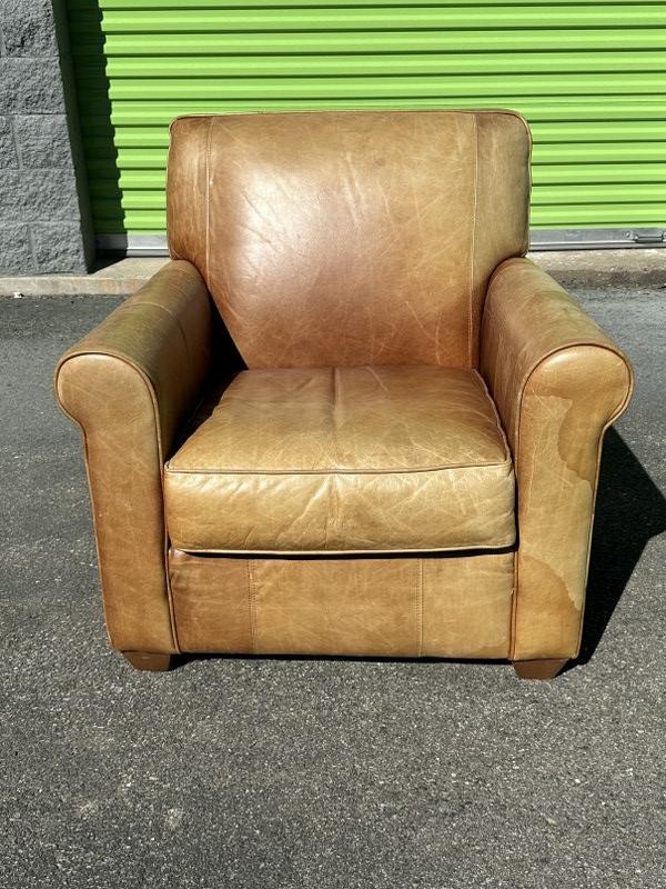 BAHAUS tan leather club chair, from fine Hudson Valley country home, stained on right side as (1 of 5)