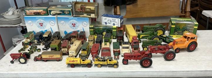 Estate lot die cast vehicles including banks, some still new in packages and boxes, a good portion (1 of 6)