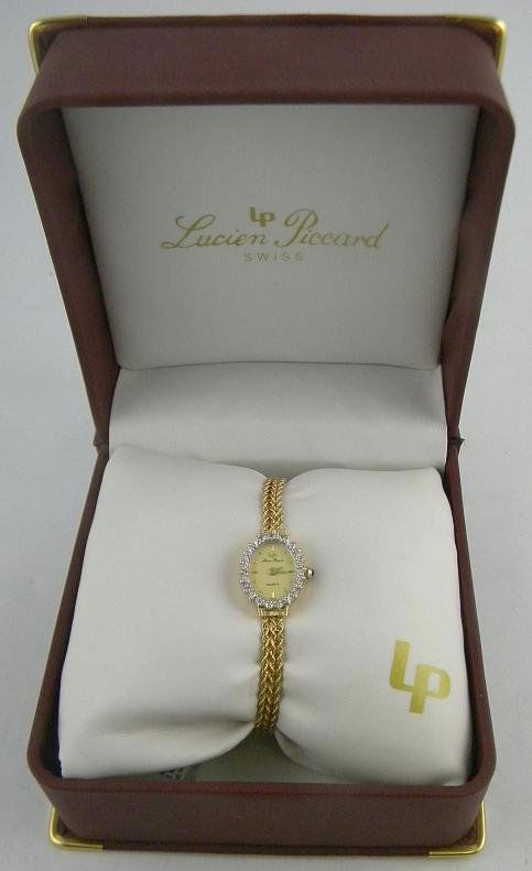 LUCIEN PICCARD Ladies 14K Quartz Wristwatch New In: LUCIEN PICCARD Ladies 14K Quartz Wristwatch New In Box. Total weight is 7 pennyweights.