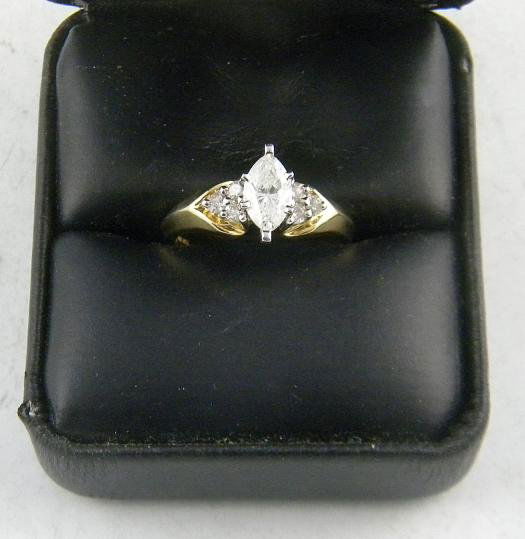 14K 1 Carat Total Weight Diamond Marquis Wedding R: 14K 1 Carat Total Weight Diamond Marquis Wedding Ring, yellow gold.