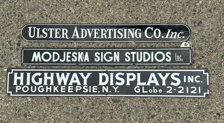 (3) older enamel signs that probably hung on billboards, found in old Sign Makers outbuilding, the (1 of 1)