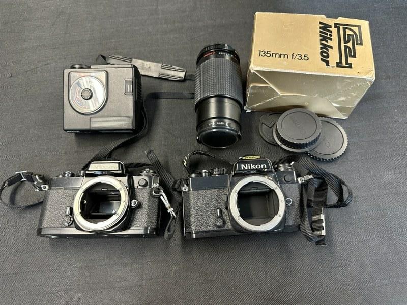 Estate lot (2) NIKON 35mm cameras with (2) lenses, some odd caps, and NIKON Speedflash SB-15. Just (1 of 4)