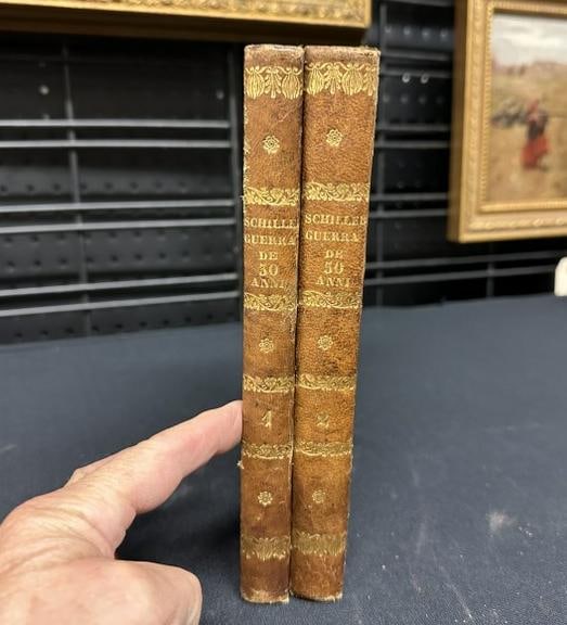 (2) voulme set STORIA DELLA GUERRA DE'TRENT' ANNI , dated 1822, light foxing, leather spines, with: (2) voulme set STORIA DELLA GUERRA DE'TRENT' ANNI , dated 1822, light foxing, leather spines, with some light wear to covers. Books in this auction come from a fine estate, all books have been in indo