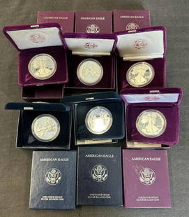 (6) one ounce AMERICAN EAGLE SILVER BULLION COINS, mint, in boxes, just like they were sent.: (6) one ounce AMERICAN EAGLE SILVER BULLION COINS, mint, in boxes, just like they were sent. Includes (2) 1986 - (1) 1987 - (1) 1990 - (1) 1997 - (1) 2004.
