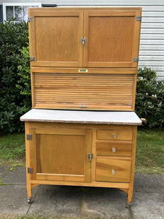 Circa 1900 birch 2 part kitchen HOOSIER cabinet, older refinish, structurally sound, from Hudson: Circa 1900 birch 2 part kitchen HOOSIER cabinet, older refinish, structurally sound, from Hudson Valley estate. Measures 70" high x 40 1/2" wide x 27" deep at base.