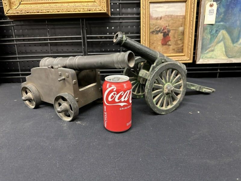 (2) cannons from local estate, one is brass, one is iron, they measure 15" front to back, just as we: (2) cannons from local estate, one is brass, one is iron, they measure 15" front to back, just as we found them.