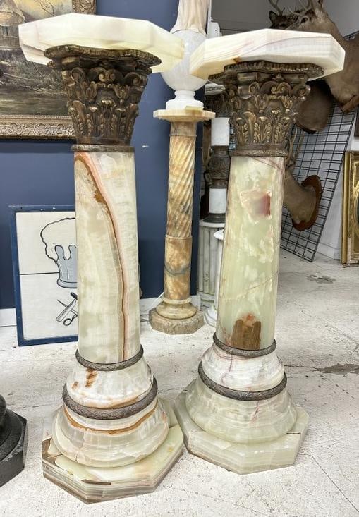 Beautiful pair of onyx pedestals with decorative brass trim under tops and around bases. From fine (1 of 5)