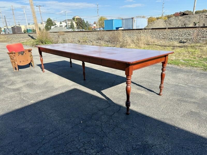 Wonderful cherry long farm like dining extension table with (7) leaves that measure 12 1/8" wide x (1 of 11)