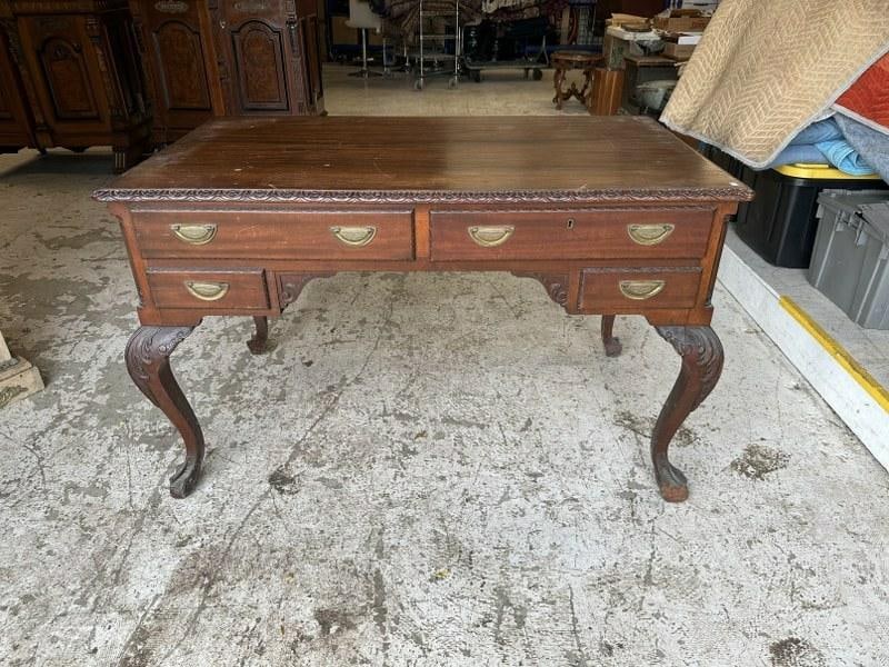 Circa 1910 mahogany claw foot partners table with (2) drawers on each side opening, and (2) faux (1 of 2)