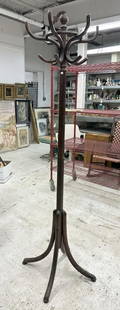 Older bentwood coat rack from estate in Hudson Valley, structurally sound, original finish. The top: Older bentwood coat rack from estate in Hudson Valley, structurally sound, original finish. The top revolves, some light wear in spots to finish.