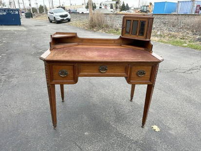 Wonderful Continental ladies writing desk, mahogany with felt top, with glass writing surface.  From: Wonderful Continental ladies writing desk, mahogany with felt top, with glass writing surface. From NYC estate, their family brought their furniture over from Austria in 1938, structurally sound, nice