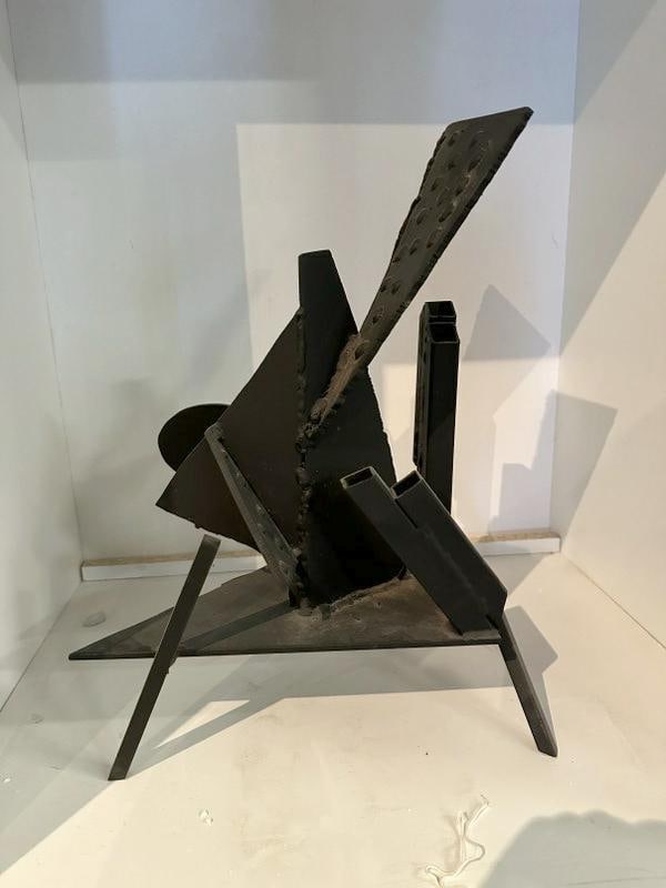 "High rise" abstract metal sculpture by Glen Mayo. This countertop sculpture is oil paint on iron (1 of 1)