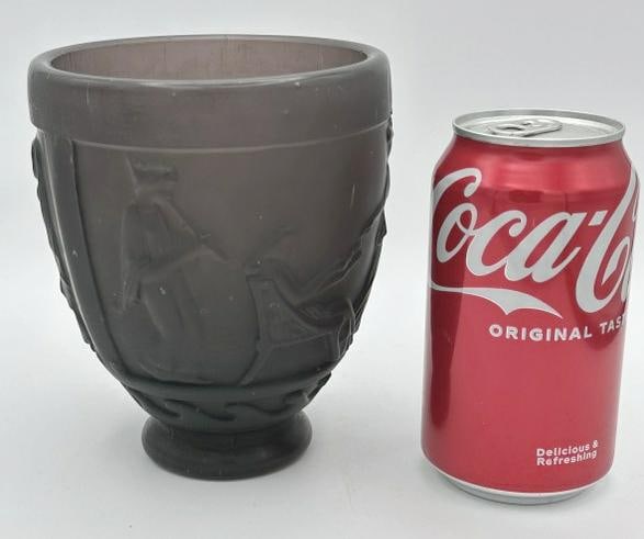 Georges De Feure ( 1868-1943 ) France, art glass Deco vase, purple glass, with raised classical: Georges De Feure ( 1868-1943 ) France, art glass Deco vase, purple glass, with raised classical figures all the way around the base. In very nice condition, it measures 5 .75" high.