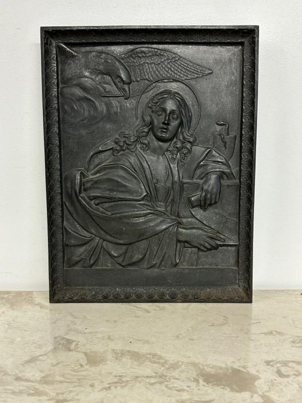 Religious cast iron placque of possibly a Saint ( halo ), with Eagle overhead and snake on his side. (1 of 3)