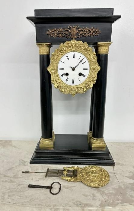 Mantle clock, most likely French, fancy pendulum, has keys, porcelain dial has hairline, has back: Mantle clock, most likely French, fancy pendulum, has keys, porcelain dial has hairline, has back cover, nice finish to the body, measures 17" high