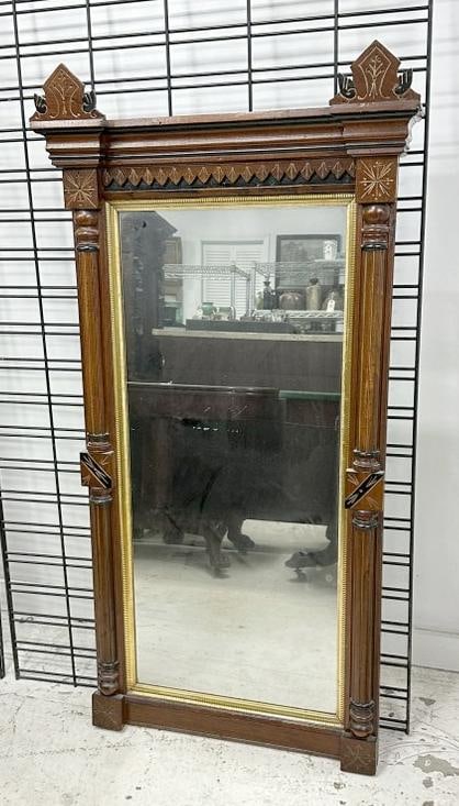 Victorian black walnut mirror in very nice original condition, measures 52 1/2" high X 24" wide (1 of 1)